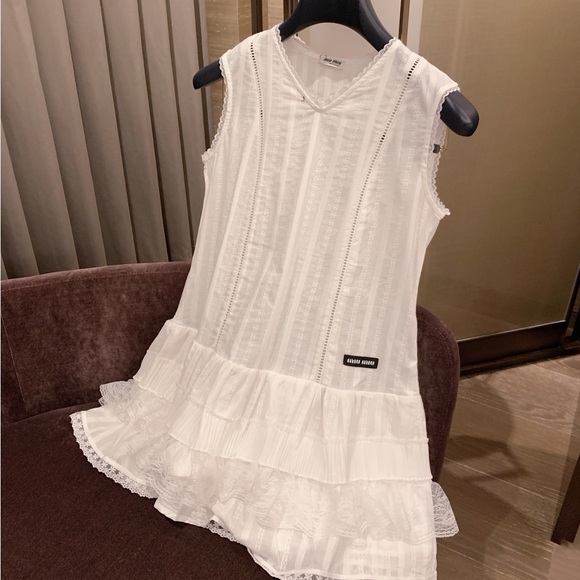 Miu Miu Dresses & Skirts - Miu Miu Ivory Sleeveless Mini Dress